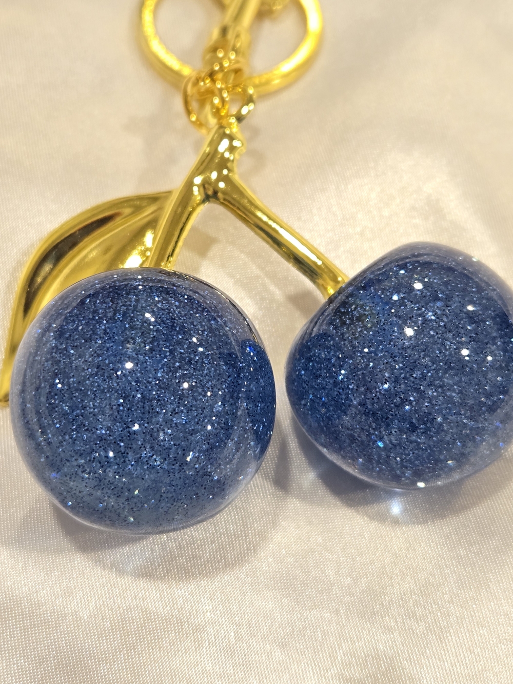 Gold-Tone Cherry Keychain with Sparkling Navy Blue Charms - Picture 3 of 3